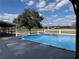 Relax by the pool and enjoy views of the open pasture and blue skies at 2685 Cr 776, Webster, FL 33597