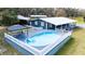 Inviting pool area features a gazebo and a spacious deck, perfect for outdoor entertaining at 2685 Cr 776, Webster, FL 33597