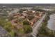 Sprawling apartment complex with multiple buildings surrounded by trees and ample parking at 2804 N Powers Dr # 27, Orlando, FL 32818