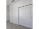 This bedroom has carpet and a sliding door closet at 2854 Supermarine Rd, Tavares, FL 32778