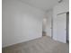 This bedroom has carpet and a large closet at 2854 Supermarine Rd, Tavares, FL 32778