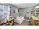 Bright bathroom featuring a tiled floor, soaking tub, and ample natural light at 3215 Park Branch Ave, Clermont, FL 34711