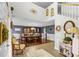 Elegant dining room with hardwood floors and staircase, ideal for Gathering gatherings at 3215 Park Branch Ave, Clermont, FL 34711