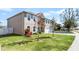 Well-maintained two-story home features a manicured lawn and attached two-car garage at 3215 Park Branch Ave, Clermont, FL 34711