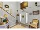 Inviting foyer with high ceilings, stylish decor, and a staircase at 3215 Park Branch Ave, Clermont, FL 34711