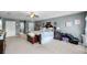 Large main bedroom suite features elegant decor, carpeting, and double door closets at 3215 Park Branch Ave, Clermont, FL 34711