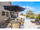 Outdoor patio with dining table, seating and a pool view at 3215 Park Branch Ave, Clermont, FL 34711
