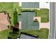 Aerial view of a home showcasing the roof, landscaping, driveway, and neighborhood layout at 3218 Woodridge Dr, The Villages, FL 32162
