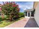 Secluded back patio with a brick deck and mature landscaping at 3218 Woodridge Dr, The Villages, FL 32162