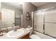 Clean bathroom featuring a tub and shower combination, a vanity with storage, and neutral tones at 3218 Woodridge Dr, The Villages, FL 32162
