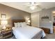 Comfortable bedroom with a ceiling fan, cozy lighting, and a closet for ample storage space at 3218 Woodridge Dr, The Villages, FL 32162