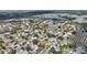Aerial view capturing the charm of a residential community with a mix of housing options at 3310 Osprey Hill St, Clermont, FL 34714
