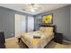 Bedroom with ceiling fan, closet, neutral paint, and plush carpet is perfect for relaxing at 3310 Osprey Hill St, Clermont, FL 34714