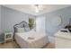 Bedroom with plush carpet, large closet, ceiling fan, and neutral paint is move-in ready at 3310 Osprey Hill St, Clermont, FL 34714