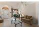 Bright living room with tile floors and chandelier at 3310 Osprey Hill St, Clermont, FL 34714