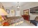 Bright main bedroom with neutral paint, carpet flooring, en-suite bathroom, and walk-in closets at 3310 Osprey Hill St, Clermont, FL 34714
