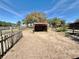 Exterior of an animal shelter with fencing and clear blue skies at 37807 Felkins Rd, Leesburg, FL 34788