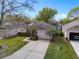 Aerial view of the property showcasing the home and surrounding neighborhood at 3812 Westerham Dr, Clermont, FL 34711