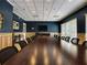 Spacious conference room with a long table, multiple chairs, and modern decor at 3812 Westerham Dr, Clermont, FL 34711