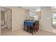 Small dining table sits next to white cabinets at 3812 Westerham Dr, Clermont, FL 34711