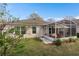 Inviting screened patio area with outdoor seating, perfect for relaxing and entertaining at 3812 Westerham Dr, Clermont, FL 34711