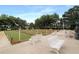 Outdoor bocce ball courts with benches and manicured landscaping at 4034 River Crest Cir, Leesburg, FL 34748