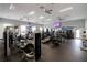 Bright fitness center with modern equipment and mirrored walls at 4034 River Crest Cir, Leesburg, FL 34748