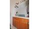 Laundry room with white countertops, plenty of storage, and tile floors at 4034 River Crest Cir, Leesburg, FL 34748