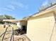 House exterior showing damaged soffit and fascia at 410 W Seminole Ave, Eustis, FL 32726