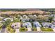 Lovely single-story home in a tranquil community surrounded by lush trees and open fields under a bright, sunny sky at 5095 China Sea Dr, Tavares, FL 32778