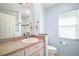 Bathroom with a sink, window and tile flooring at 5095 China Sea Dr, Tavares, FL 32778