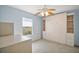 Bedroom features a murphy bed with shelving and storage and lots of natural light at 5095 China Sea Dr, Tavares, FL 32778