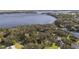 Aerial view showcasing lakefront property location at 5910 Lake Emma Ct, Groveland, FL 34736