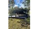 Covered boat lift on private dock at 5910 Lake Emma Ct, Groveland, FL 34736