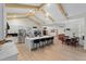 Bright, airy kitchen boasts a large island with seating, stainless steel appliances, and modern finishes for a sleek look at 5910 Lake Emma Ct, Groveland, FL 34736