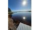 Close-up view of the lake with clear water and a serene, natural shoreline at 5910 Lake Emma Ct, Groveland, FL 34736