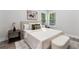 Beautiful bedroom with large windows offering natural light and a lovely view at 8264 Sw 128Th Ter, Dunnellon, FL 34432