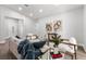 Bright living room featuring modern decor and stylish furniture in a neutral color palette at 8264 Sw 128Th Ter, Dunnellon, FL 34432