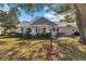 Charming single-story home with a well-maintained lawn and cozy front porch at 8862 Sw 92Nd St # D, Ocala, FL 34481