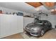 Spacious garage with ample storage cabinets and modern garage door. Car parked inside at 8862 Sw 92Nd St # D, Ocala, FL 34481
