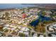 Aerial view of waterfront homes with direct access to the Gulf of Mexico at 920 Morningview Dr, Tavares, FL 32778