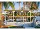 Waterfront dock with a covered boat lift offering serene water views and convenient access at 920 Morningview Dr, Tavares, FL 32778
