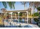 Covered dock, providing a shady and relaxing spot to enjoy the waterfront views at 920 Morningview Dr, Tavares, FL 32778
