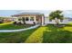 Charming single story home with well-maintained lawn and garden at 920 Morningview Dr, Tavares, FL 32778