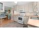 Efficient kitchen with white appliances and ample counter space at 920 Morningview Dr, Tavares, FL 32778