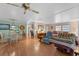 Spacious open-plan living area adjoining dining room and kitchen at 920 Morningview Dr, Tavares, FL 32778