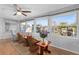 Sunroom with seating and water views, perfect for relaxing and enjoying the scenery at 920 Morningview Dr, Tavares, FL 32778