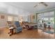 Bright living room with laminate floors and comfortable furniture at 920 Morningview Dr, Tavares, FL 32778