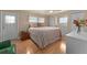 Inviting main bedroom with comfortable bed, storage, and natural light at 920 Morningview Dr, Tavares, FL 32778