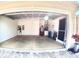 A spacious and clean two-car garage with ample room for vehicles and storage at 10177 Mainsail Dr, Oxford, FL 34484